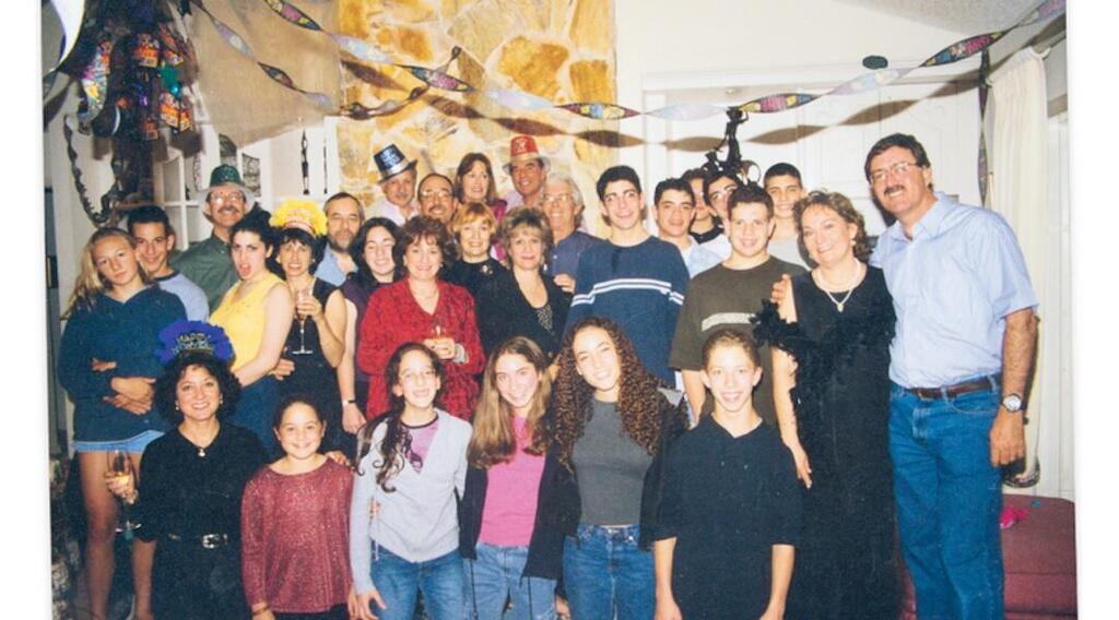 Winehouse, in the yellow shirt on left, seen at a family gathering in Florida.