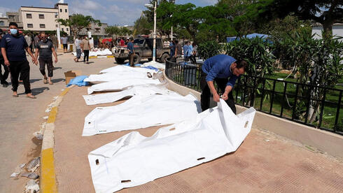 Libya floods wipe out quarter of city, thousands dead