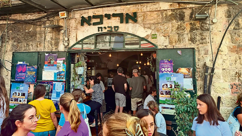 מ