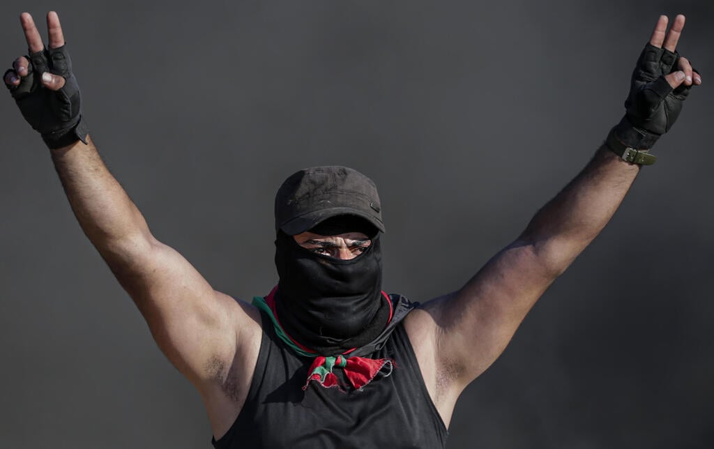 צילום: EPA/MOHAMMED SABER התפרעויות פלסטינים גבול רצועת עזה