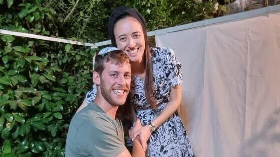 Noam and Jonathan Blutner set up sukkah in Givaat Shmuel