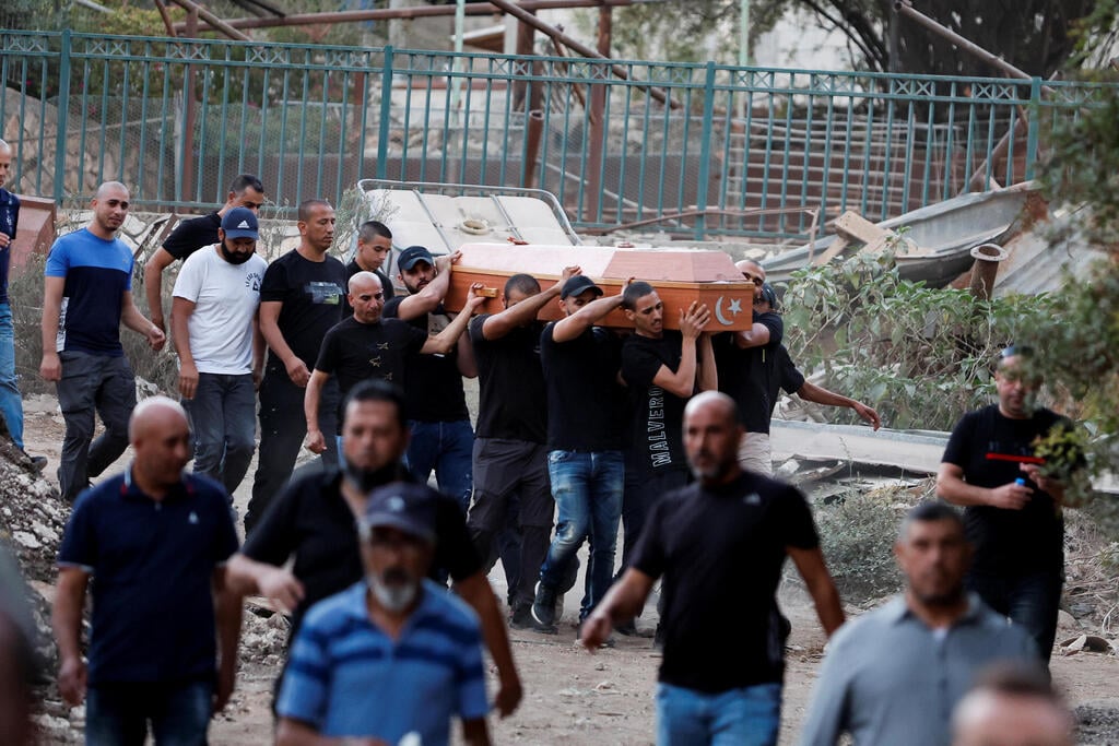 צילום: REUTERS/Ammar Awad הלווייתם של 5 הנרצחים בבסמת טבעון