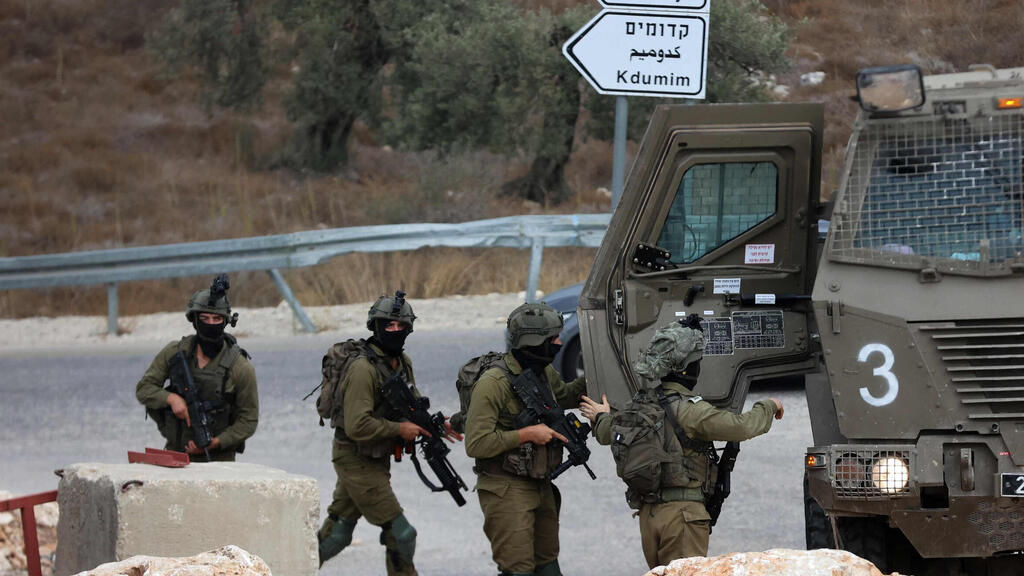 כוחות הביטחון בפעילות באזור טול כרם (צילום: Zain JAAFAR / AFP) חילופי אש בין כוחות הביטחון למחבלים בטול כרם