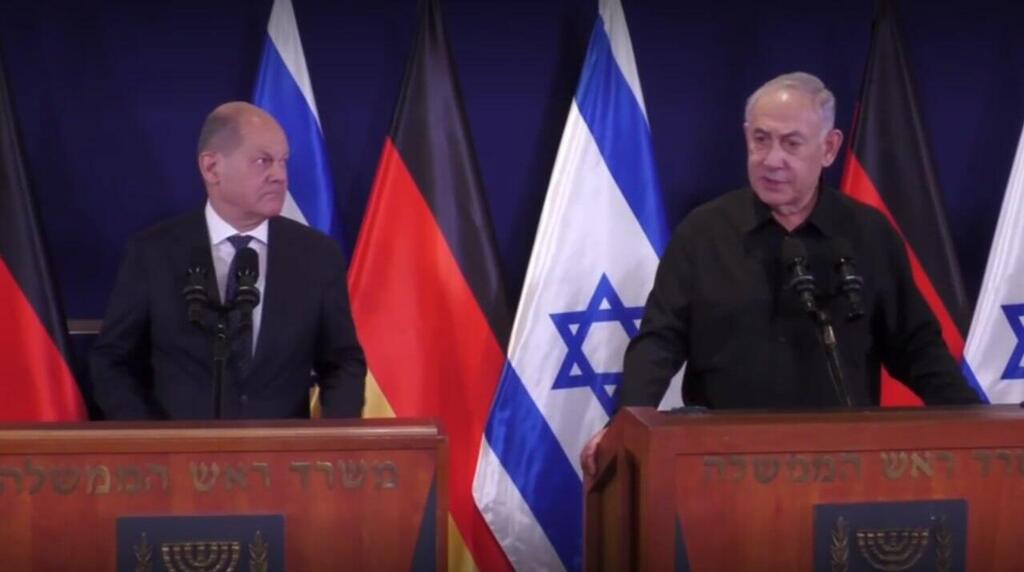 אולף שולץ, קנצלר גרמניה, ובנימין נתניהו בהצהרה לתקשורת