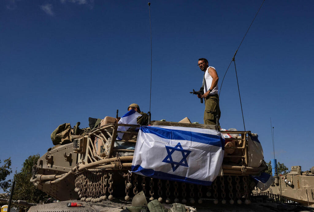 כוחות צה"ל בגבול הרצועה (צילום: RONALDO SCHEMIDT / AFP) כוחות צה"ל בגבול הרצועה