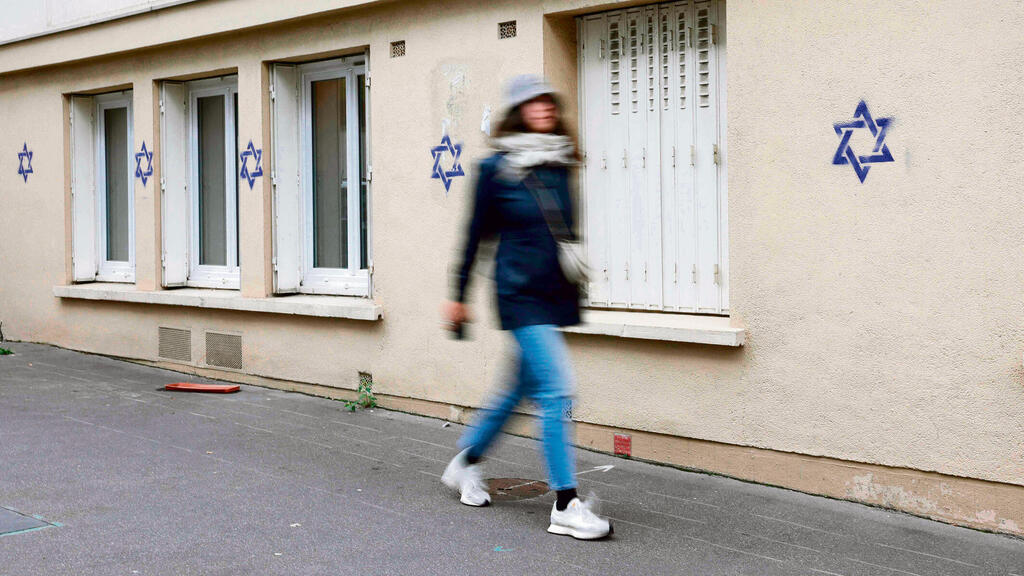 בניין בפריז, אתמול | צילום: GEOFFROY VAN DER HASSELT, AFP yk13657078