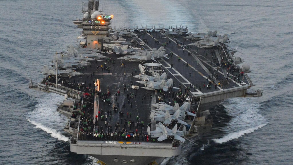 USS Dwight D. Eisenhower (Photo: Merissa Daley / Reuters) נושאת המטוסים האמריקנית אייזנהאואר בדרכה למזרח התיכון