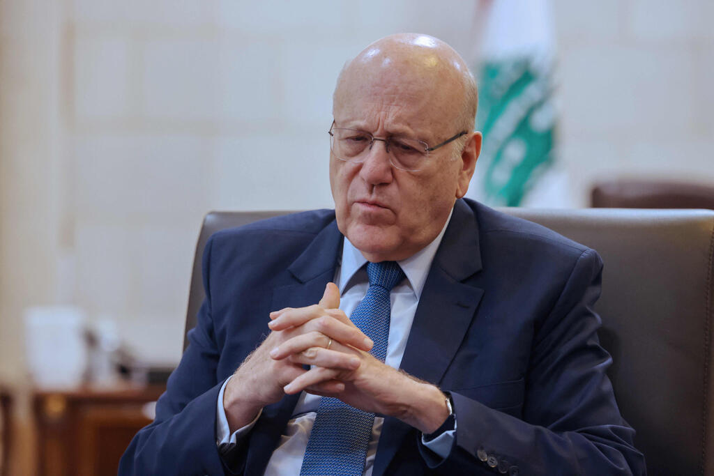רה"מ ממיקאתי. מקורות אומרים: "הוא מאמין שחיזבאללה יפעל בהיגיון" (צילום: JOSEPH EID / AFP) ראש ממשלת לבנון נג'יב מיקאתי