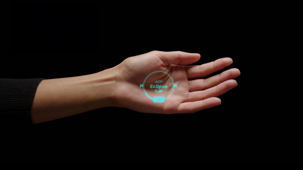 מקרן לייזר מציג את התפריט על כף היד. Ai Pin (צילום: Humane) Humane Ai Pin