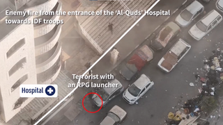 Hamas terrorists fire anti-tank missile at IDF troops from the entrance of Gaza's Al Quds Hospital 