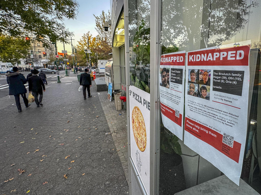 Posters of hostages held by Hamas on the walls of the Brooklyn Museum 