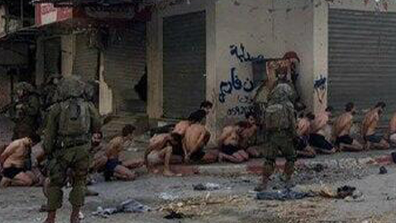 Troops guard suspected Hamas terrorists who were detained in Gaza (Photo: Mossad Commentary) מחבלי חמאס מחוץ למנהרות