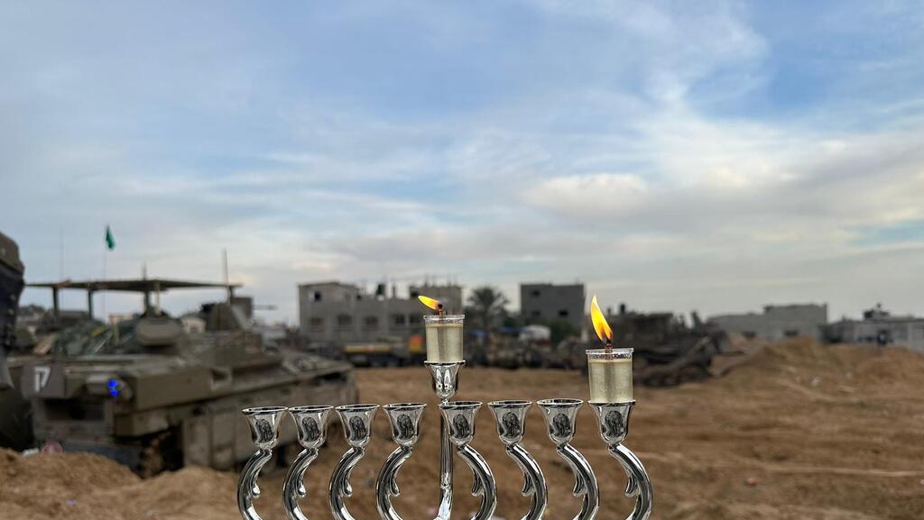 A Hanukkah menorah lit in Gaza (Photo: IDF Spokesperson's Unit) תמונות מהלחימה של כוחות צה"ל ברצועת עזה