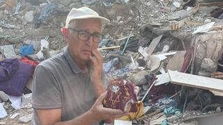 חנוכייתה של משפחת חרמש מכפר עזה שהרצוג העביר לביידן