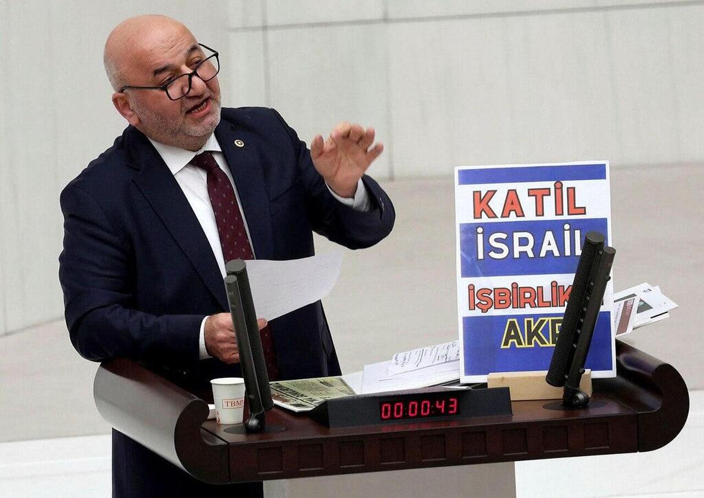 Deputy head of Turkey's Islamist Saadet (Felicity) Party Hasan Bitmez speaks on the floor of the Turkish Parliament