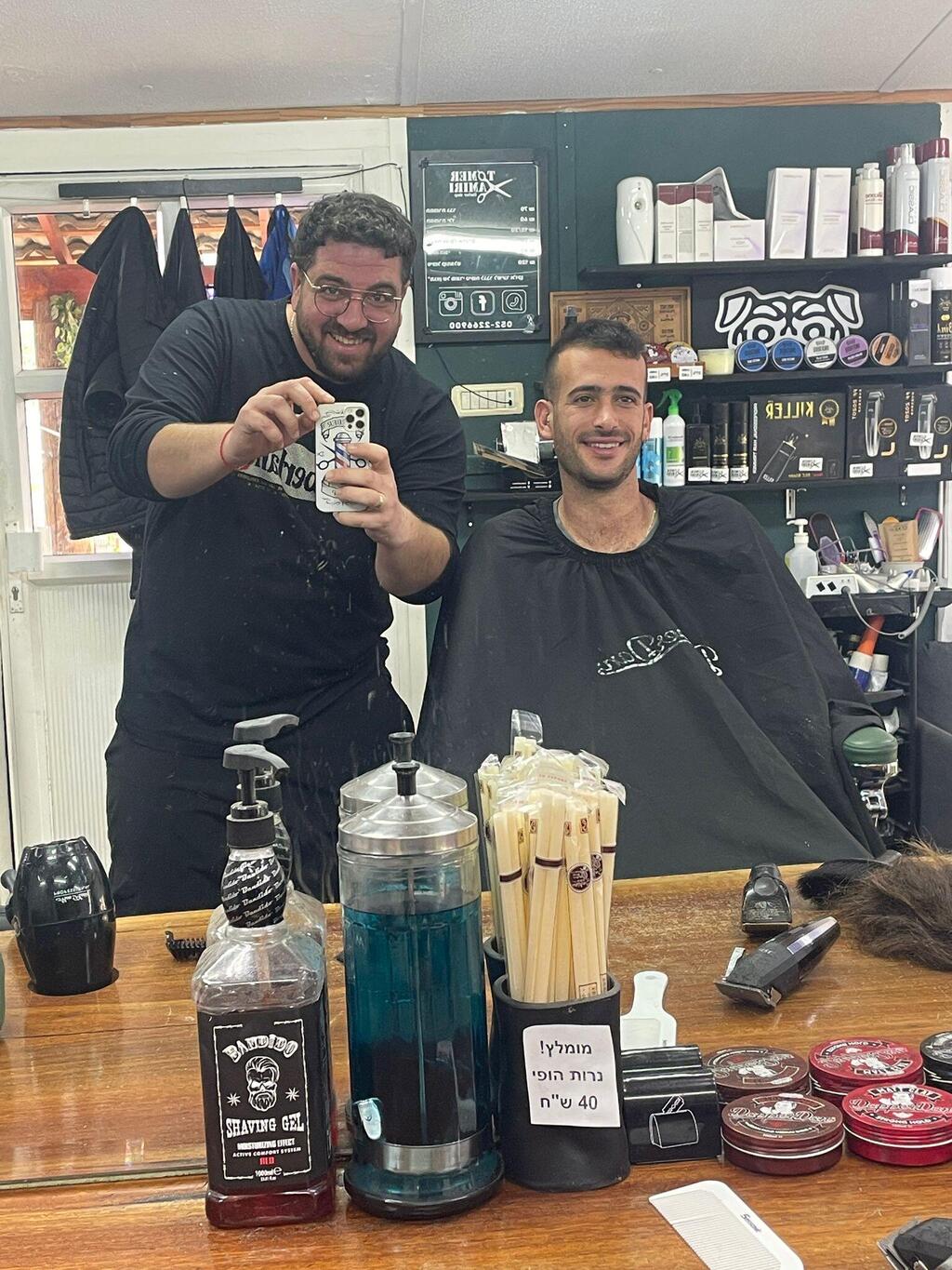 יונתן רוסו, מילואימניק, שתרם את שיערו לחולות סרטן