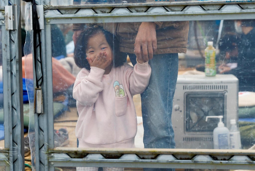 צילום: REUTERS/Kim Kyung-Hoon יפן רעידת אדמה רעש נזק בעיר ווג'ימה במחוז אישיקאווה