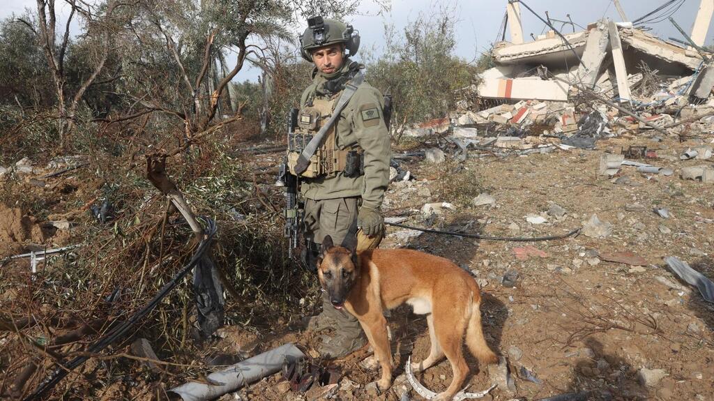 Ori Hazut with Uva the reservist dog (Photo: Yariv Katz) לו