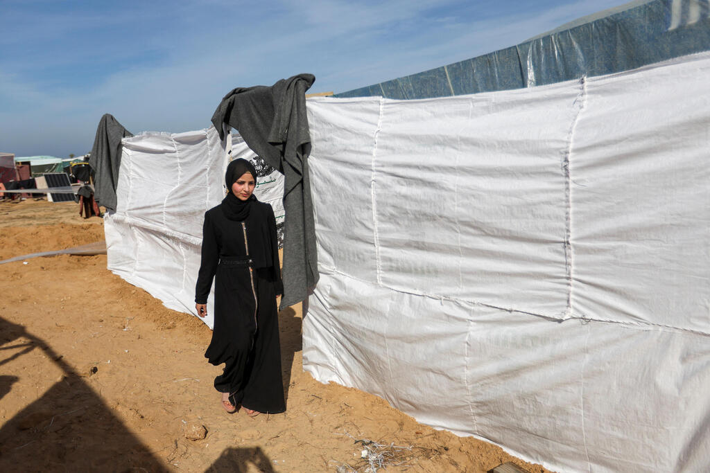 צילום: REUTERS/Ibraheem Abu Mustafa רפיח עזה פלסטינים