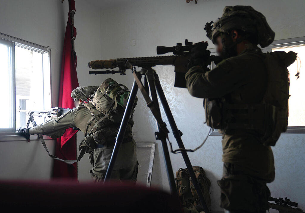 נתניהו: "צה"ל לא ייסוג מהרצועה". לוחמים בעזה, אתמול | צילום: דובר צה"ל yk13787053