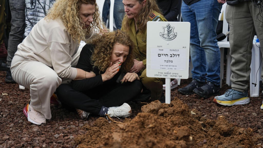 הלווייתו של סמל דולב חיים מלכה ז"ל (צילום: AP Photo/Ariel Schalit) הלווייתו של סמל דולב חיים מלכה ז"ל