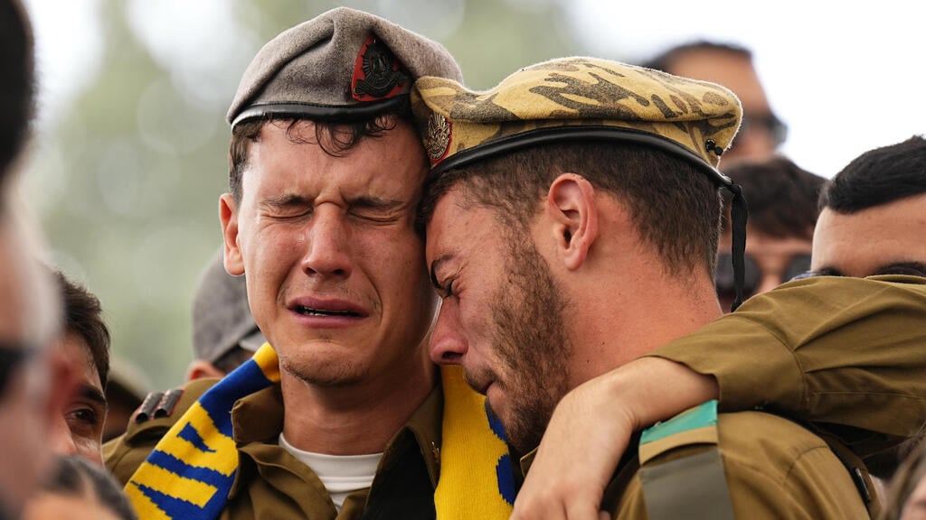 צילום: AP Photo/Ariel Schalit הלווייתו של סמל דולב חיים מלכה ז"ל