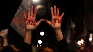 Startling photographs on display, calling for hostages return - now