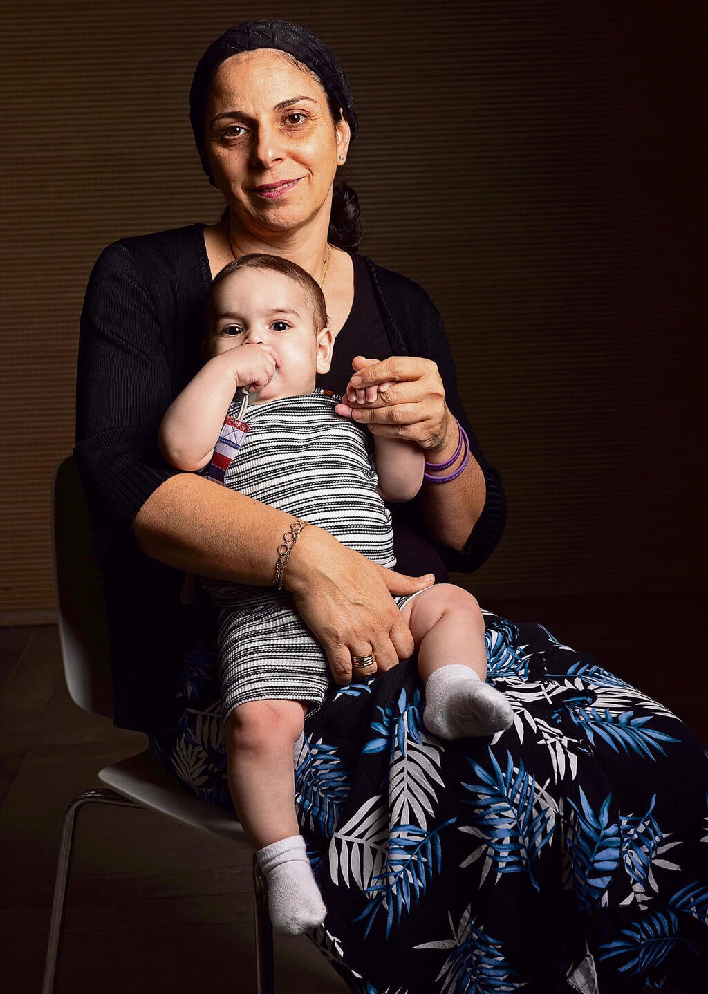 Naomi Gerby with baby Itzik (Photo: Tal Shahar) נעמי ג'רבי עם התינוק שקיבל את הכבד של בנה