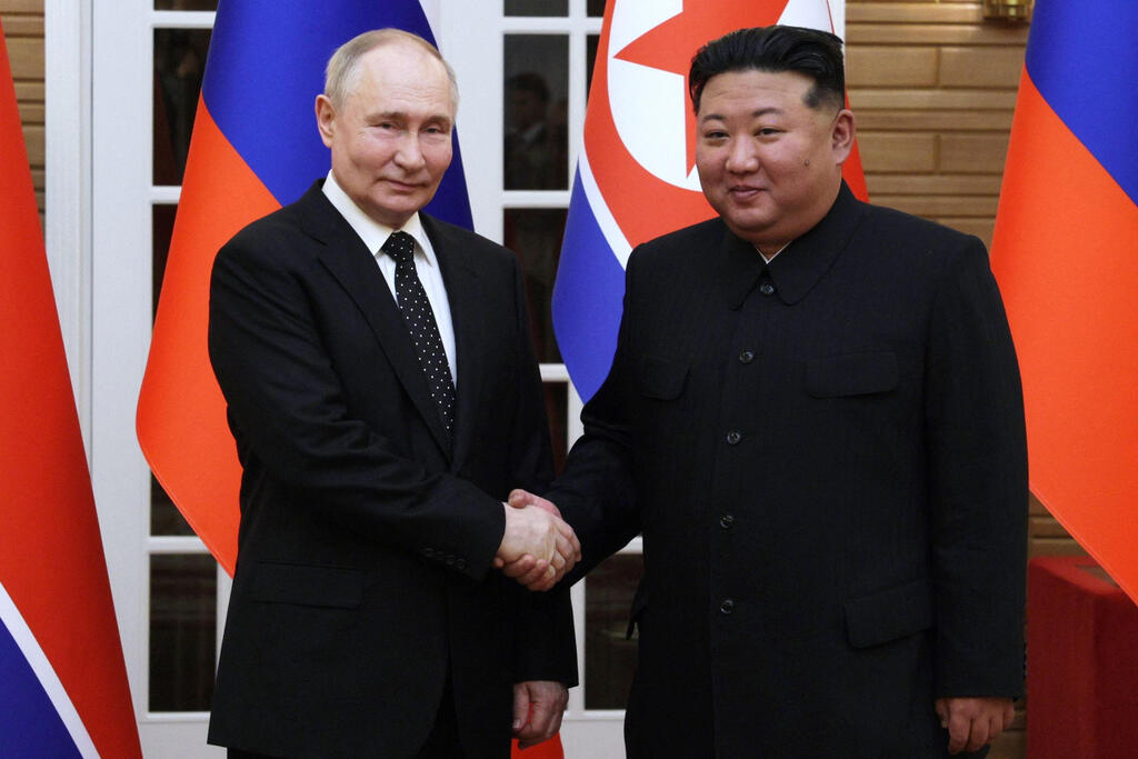Russian President Vladimir Putin and North Korean leader Kim Jong Un (Photo: Gavriil GRIGOROV / POOL / AFP) נשיא רוסיה ולדימיר פוטין עם רודן צפון קוריאה קים ג'ונג און בביקור ב פיונגיארנג