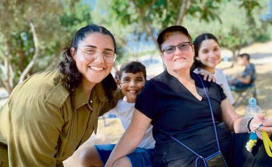 Cpl. Noa Marciano with her grandmother Bella Shoshan (Photo: Courtesy of the family) yk13978323
