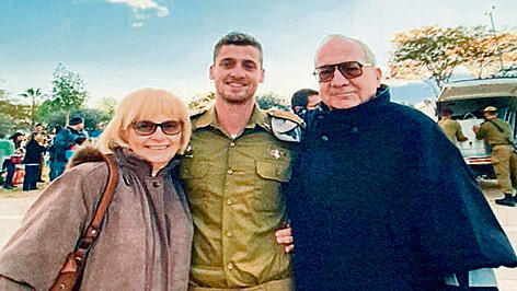 Captain Asaf Master with his grandparents, Shosh and Dani (Photo: Courtesy of the family) yk13978324