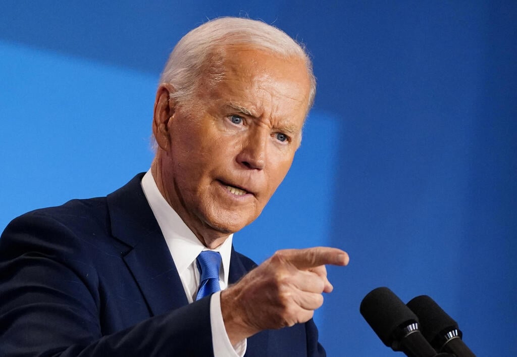 Conspiracy theories already circling about Biden's 'involvement' (Photo: REUTERS/Nathan Howard) נאום ג'ו ביידן במסיבת העיתונאים בסיום פסגת נאט"ו ה-75 בוושינגטון, ארה"ב