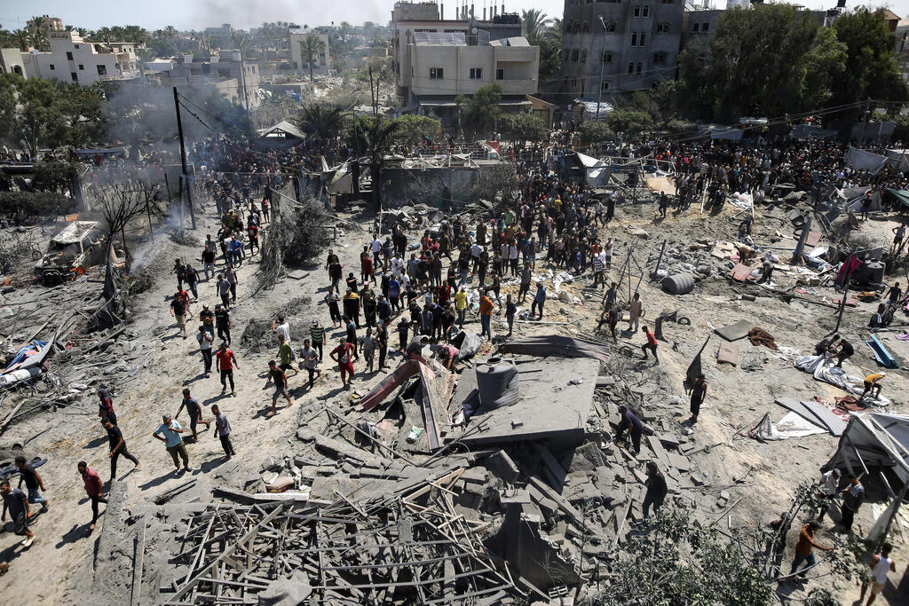 ההרס, בזירת ניסיון החיסול (צילום: EPA/HAITHAM IMAD) רצועת עזה לאחר חיסול מוחמד דף