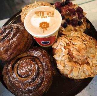 Cafe Otef  has opened two kosher coffee shops, with limited menus but encompassing delis and gift shops on their respective premises