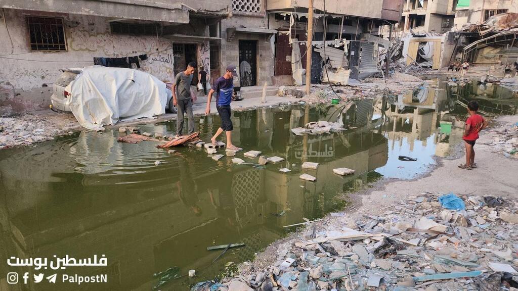Open sewage flows in Khan Younis ביוב זורם חאן יונס רצועת עזה