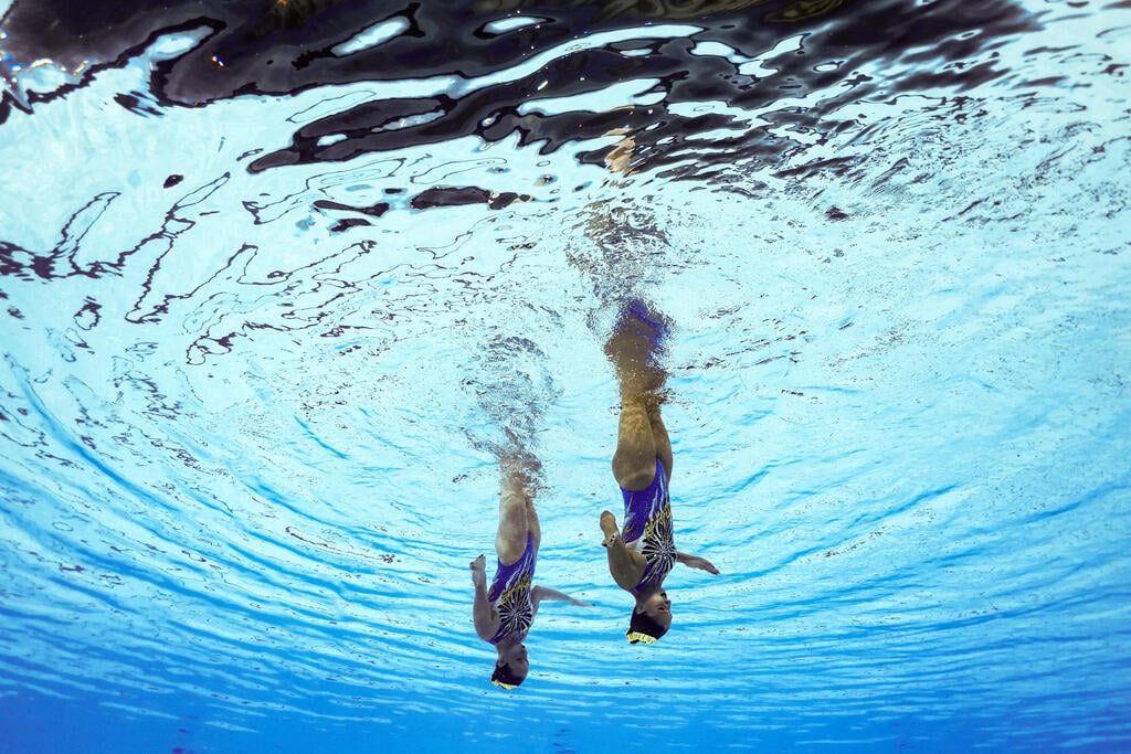 בובריצקי ונשיא (צילום: REUTERS/Marko Djurica) בובריצקי ונשיא