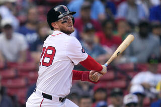 Baseball star plays for both teams during the same game