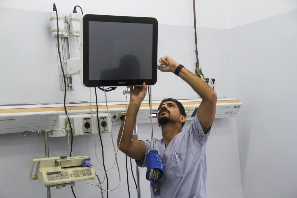 צילום: REUTERS/Mahmoud Issa בית חולים שיפא עזה
