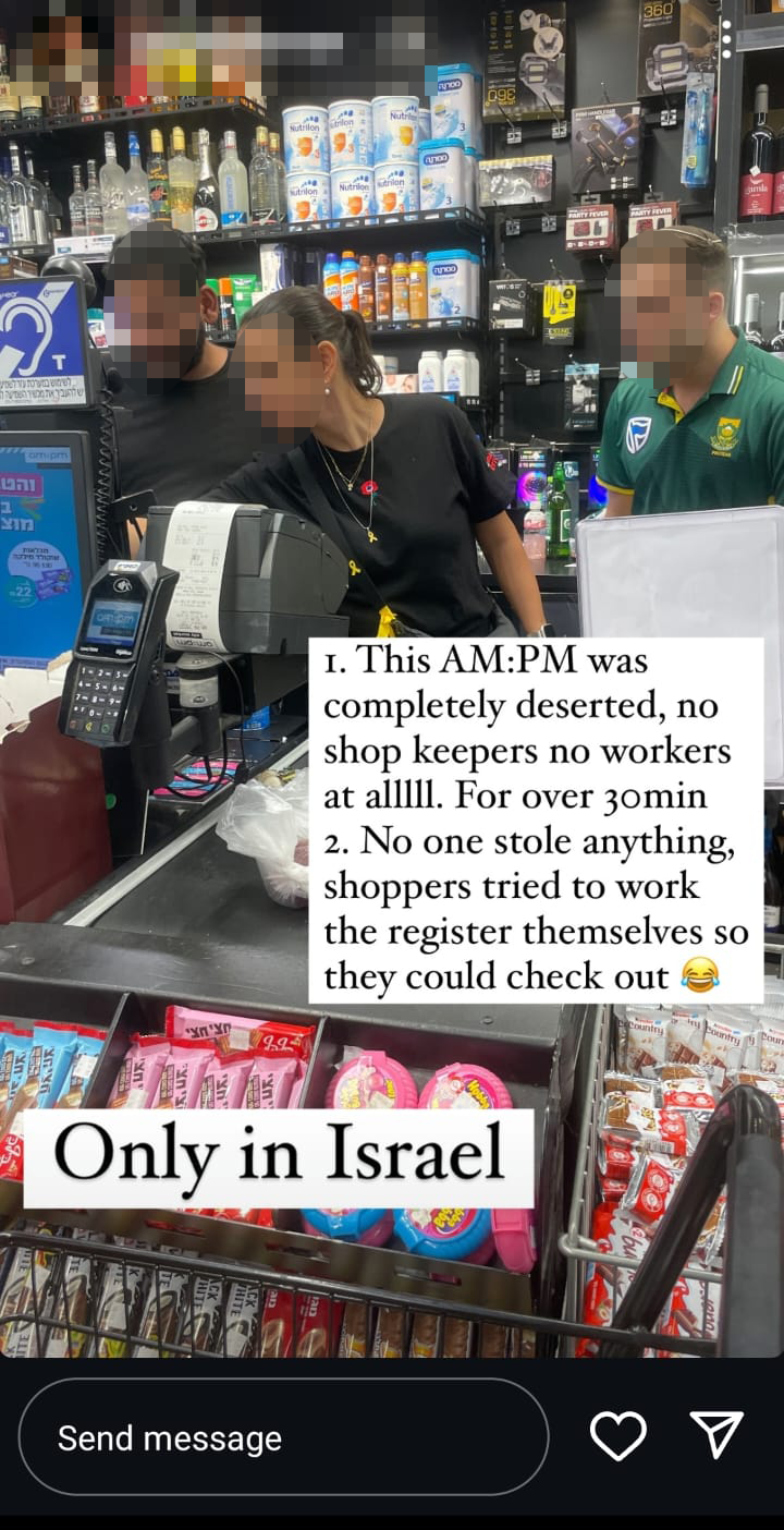 Customers at the Tel Aviv AM:PM store operating the register Customers at the Tel Aviv AM:PM store operating the register