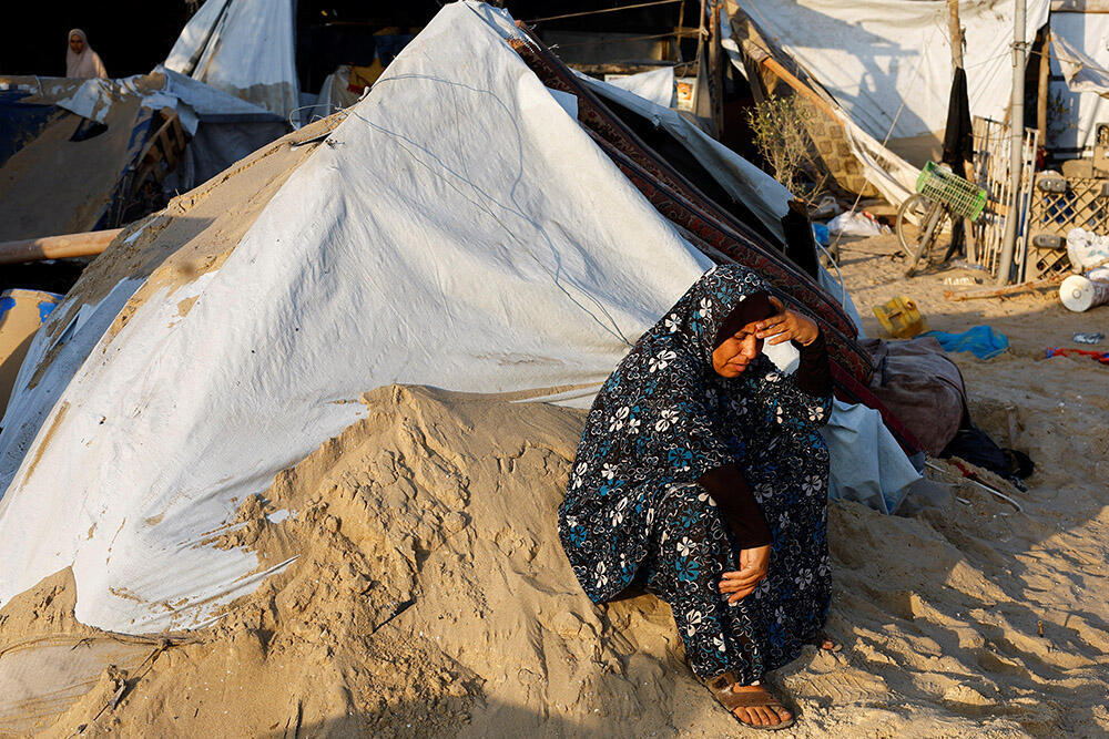 צילום: REUTERS/Mohammed Salem זירת התקיפה בחאן יונס