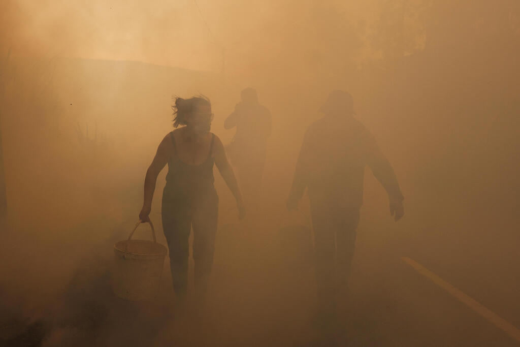 צילום: REUTERS/Pedro Nunes פורטוגל שריפה שריפות יער