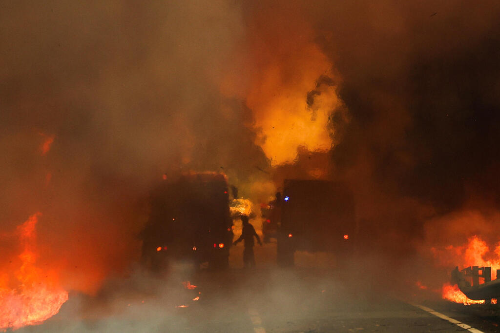 צילום: REUTERS/Pedro Nunes פורטוגל שריפה שריפות יער