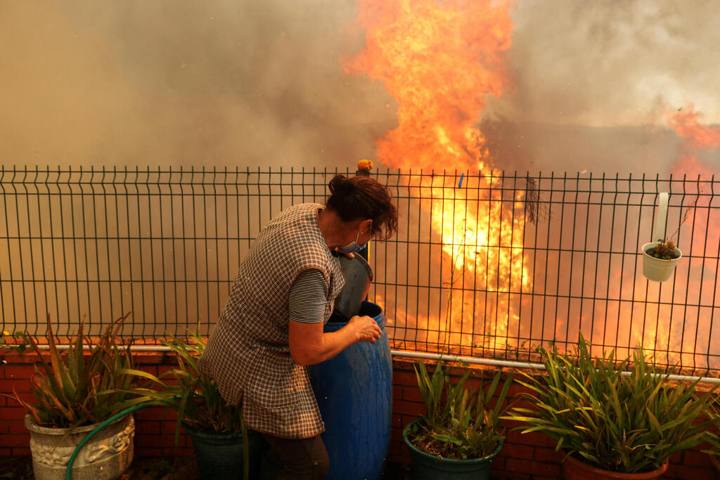צילום: REUTERS/Pedro Nunes פורטוגל שריפה שריפות יער