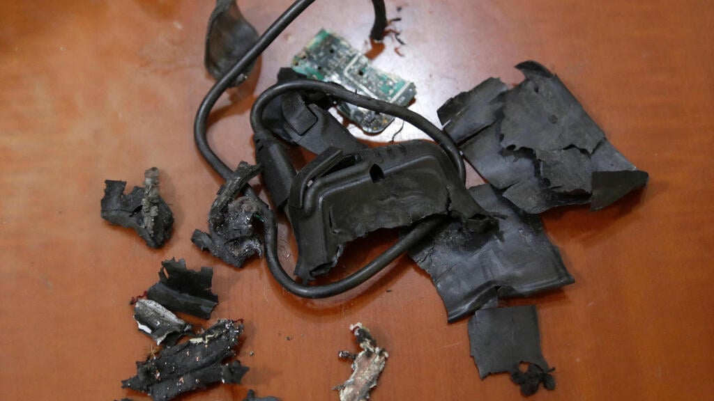 Remains of exploded pager (Photo: AFP) שרידי ביפר שהתפוצץ