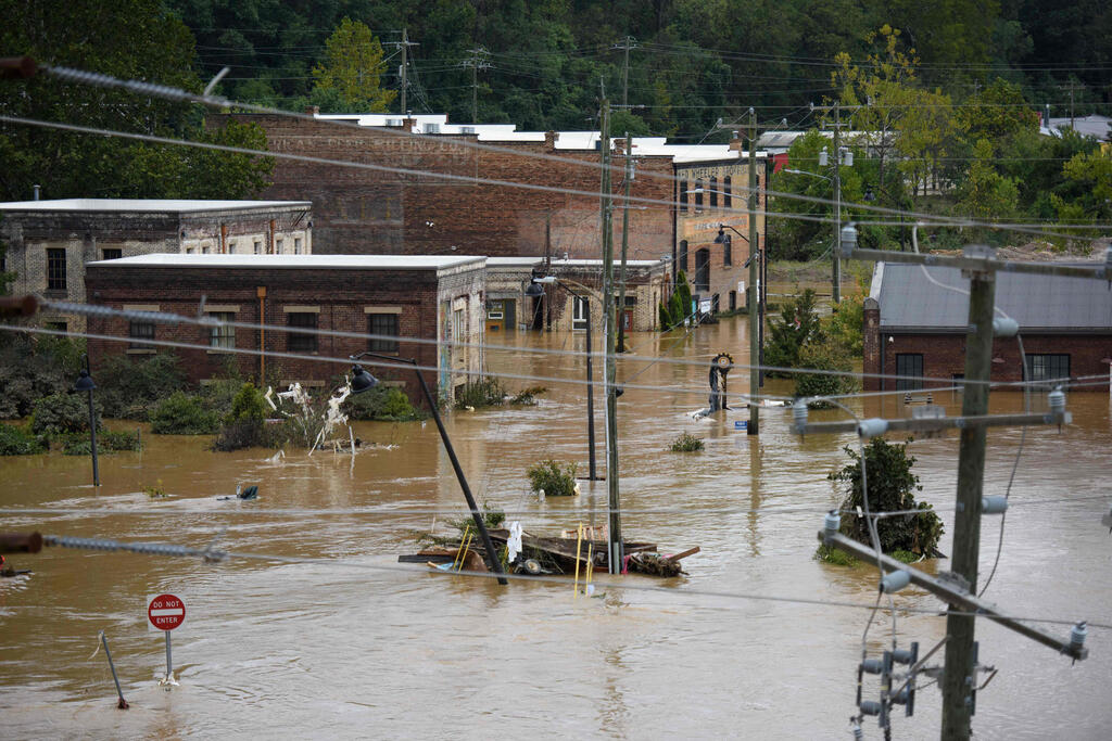 צילום: Melissa Sue Gerrits / GETTY IMAGES NORTH AMERICA / AFP אשוויל צפון קרוליינה סופה סופת הוריקן הלין ארה"ב