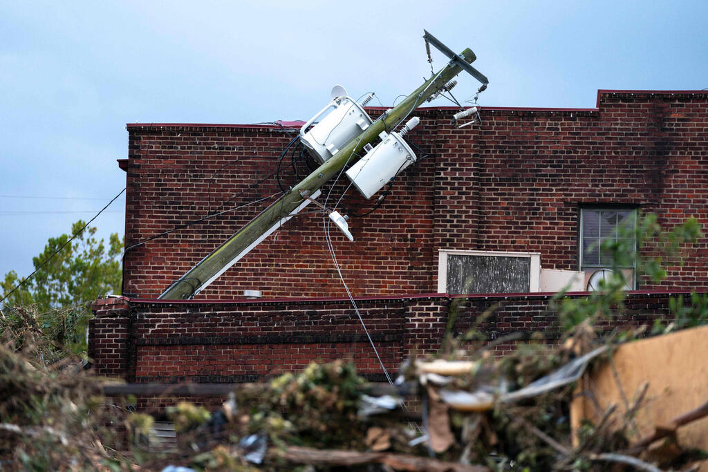 צילום: Sean Rayford / GETTY IMAGES NORTH AMERICA / AFP אשוויל צפון קרוליינה סופה סופת הוריקן הלין ארה"ב