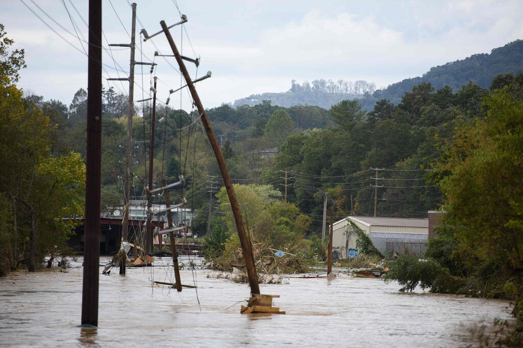 צילום: Melissa Sue Gerrits / GETTY IMAGES NORTH AMERICA / AFP אשוויל צפון קרוליינה סופה סופת הוריקן הלין ארה"ב