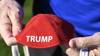 Republican Jewish Coalition member David Cuttner displays a yarmulke promoting Donald Trump 