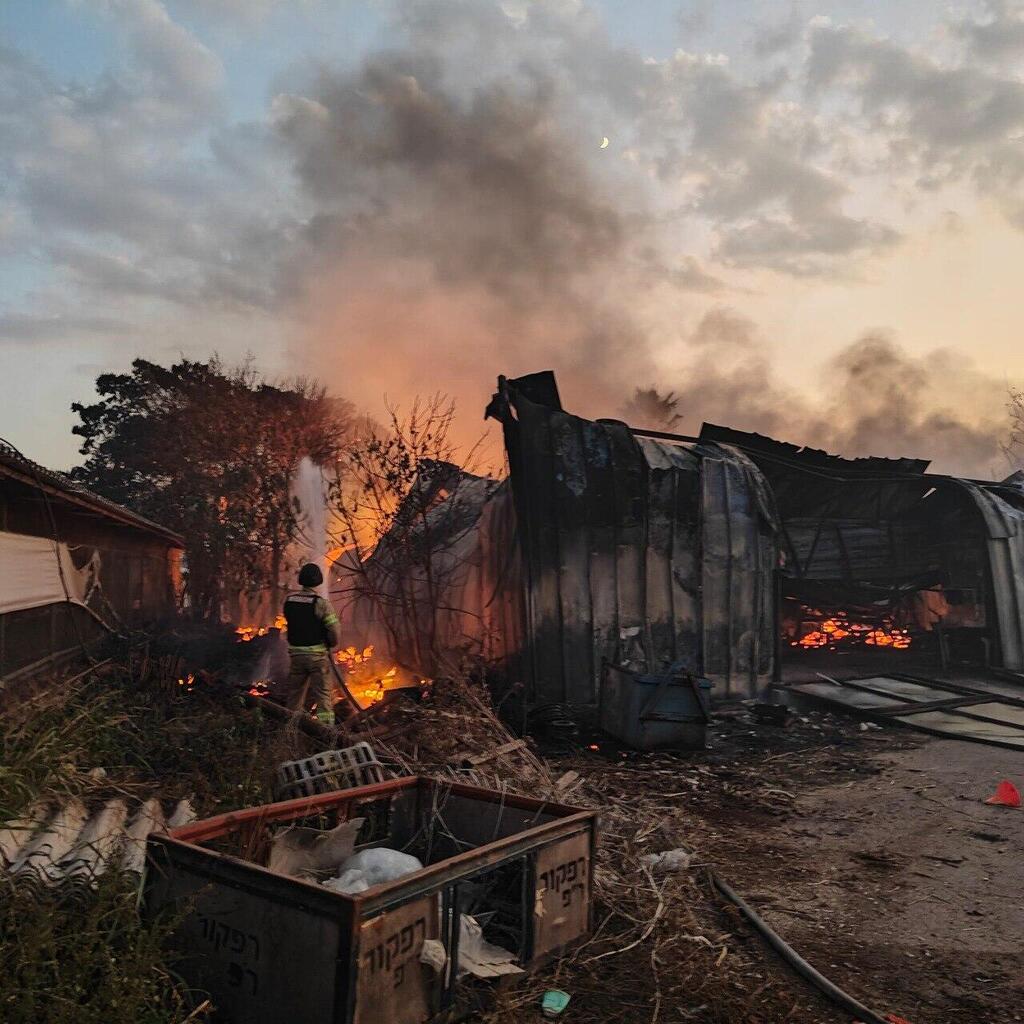 Photo: Fire and Rescue Services Northern District פגיעת רקטה במושב אביבים בעקבות מטח רקטות מלבנון