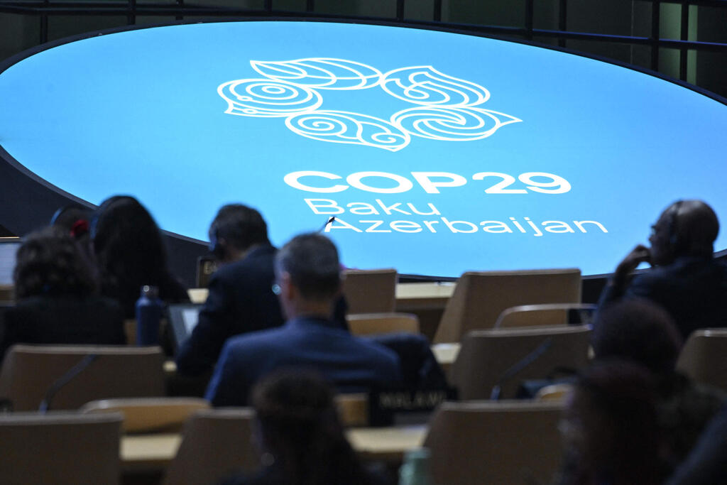 Participants listen to speeches during the United Nations Climate Change Conference (COP29) in Baku on November 13, 2024 (Photo: Alexander Nemenov / AFP) Participants listen to speeches during the United Nations Climate Change Conference (COP29) in Baku on November 13, 2024